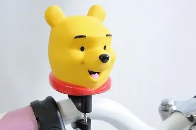 WINNIE THE POOH & TIGGER GRIPS, WITH A WINNIE THE POOH HANDLEBAR HORN -SQUEAKER